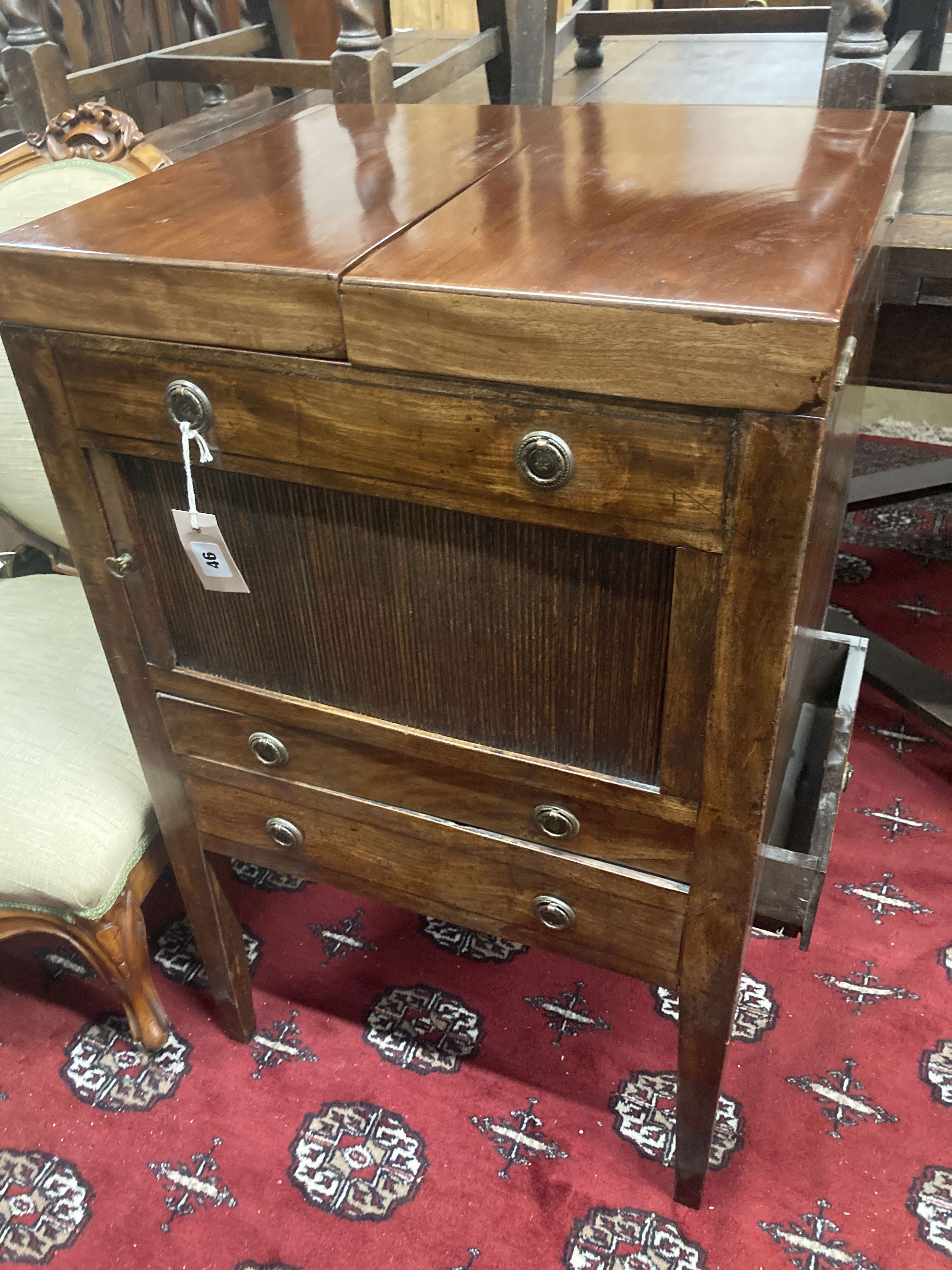 A George III mahogany tambour front enclosed washstand, width 53cm, depth 45cm, height 87cm